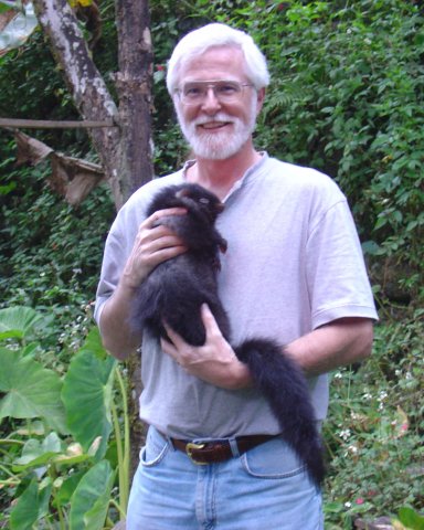 Larry Heaney holding a cloud rat